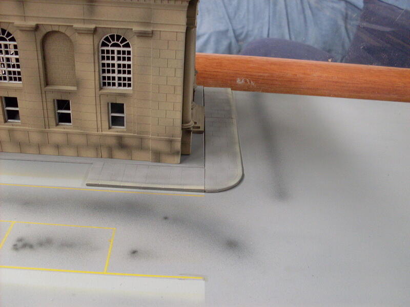 Stained Road Surface Near Bank