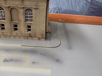 Stained Road Surface Near Bank